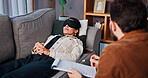 Consulting, hypnosis and therapy with people in clinic together for mental healthcare, help or support. Eye mask, psychology and therapist speaking to patient in office for healing or rehabilitation