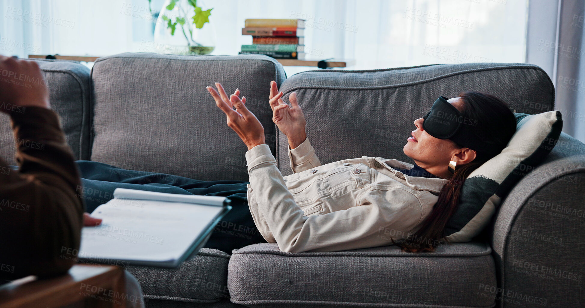Buy stock photo Woman, relax and talking for therapy session in office with hypnotherapy, guidance and technique. People, therapist and counseling notes for sensory awareness, healing subconscious and rehabilitation