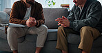 Psychology, therapist and hands with men in consultation for help, mental health advice or support. Therapy, life coach and people in counseling session for assessment, feedback and evaluation
