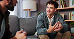 Psychology, therapist and happy man talking for help, mental health advice or support in office. Counseling session, life coach and people in therapy for assessment, consultation and evaluation