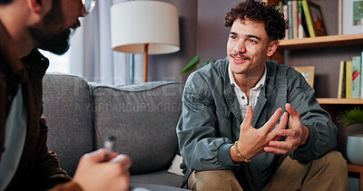 Buy stock photo Psychology, therapist and happy man talking for help, mental health advice or support in office. Counseling session, life coach and people in therapy for assessment, consultation and evaluation