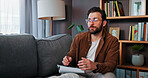 Counseling, notebook and psychology with therapist man in office for advice, feedback or help. Consulting, mental health and therapy with psychologist on sofa for healing, rehabilitation or support