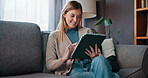 Smile, reading and woman with tablet on sofa, digital news article and social media break on weekend. Ebook app, browsing internet and person with tech in home, check email and subscription service