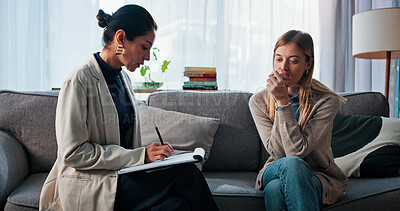 Buy stock photo Mental health, counseling or women in office with notebook, evaluation or therapy in clinic visit. People, patient or psychologist with writing pad, emotional support or advice in trauma session.