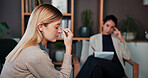 Frustrated, woman and anxiety with therapist for counseling, emotional support and help. Grief, psychologist and patient with appointment for compassion, trauma recovery and advice for stress