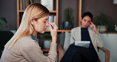 Buy stock photo Frustrated, woman and anxiety with therapist for counseling, emotional support and help. Grief, psychologist and patient with appointment for compassion, trauma recovery and advice for stress