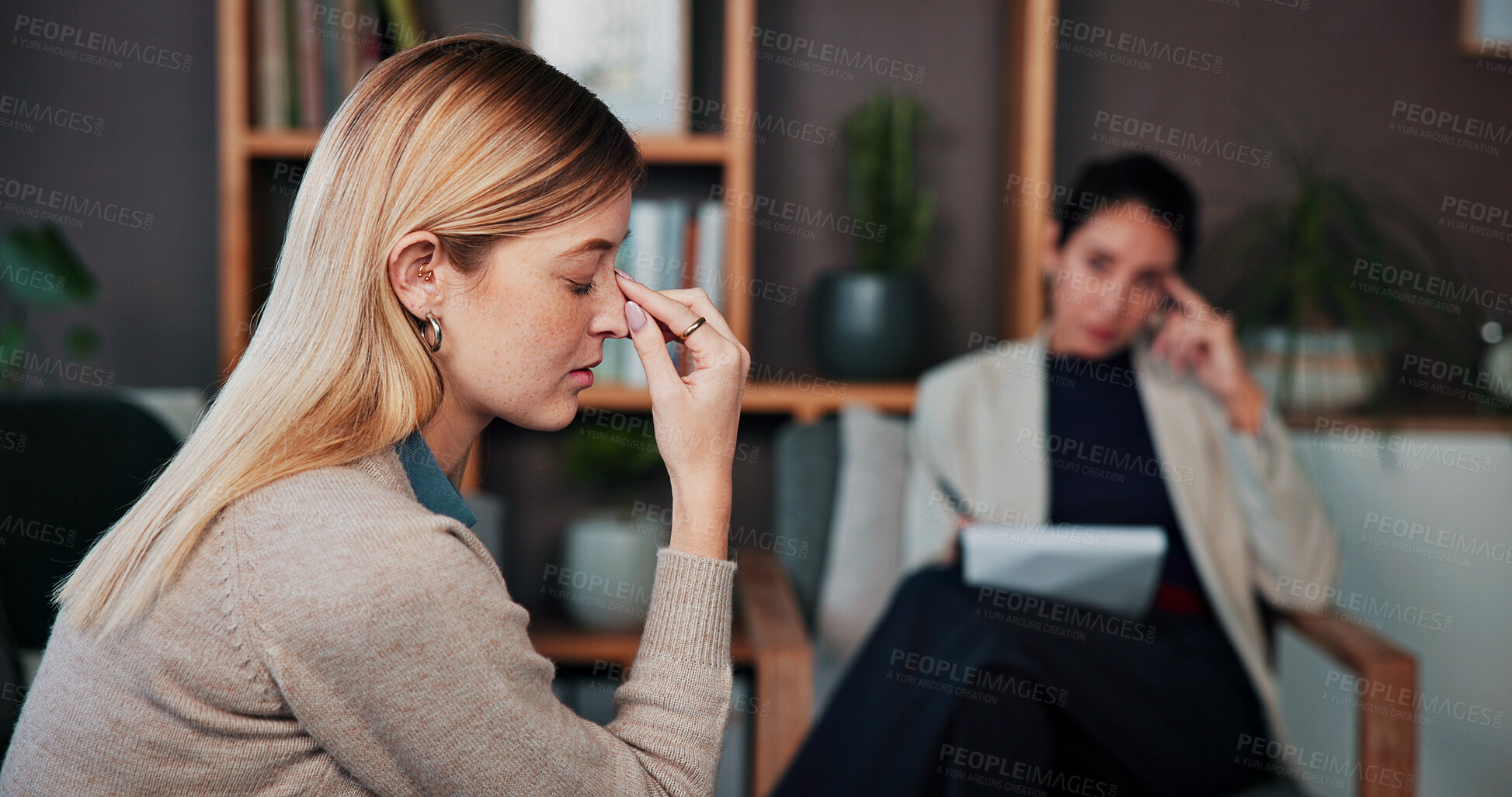 Buy stock photo Frustrated, woman and anxiety with therapist for counseling, emotional support and help. Grief, psychologist and patient with appointment for compassion, trauma recovery and advice for stress