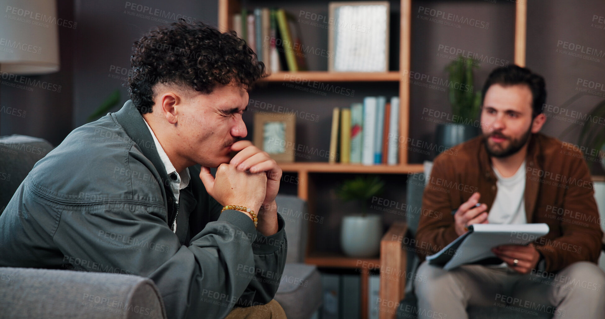 Buy stock photo Mental health, frustration or men in office with notebook, evaluation or grief in clinic visit. Stress, patient or psychologist with writing pad, trauma support or loss advice in therapy session.