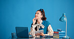 Studio, thinking and business woman with tablet, story inspiration and planning on blue background. Smile, author and person with technology for idea, vision and creative reflection for novel