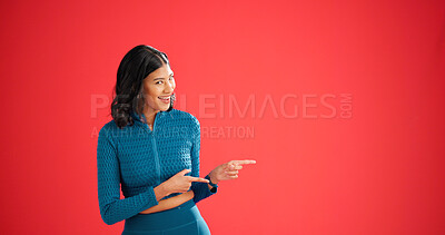 Buy stock photo Fitness, pointing and woman with portrait in studio, sports club discount and sign up for training. Promotion, membership sale and coach with mockup space for announcement, smile or red background