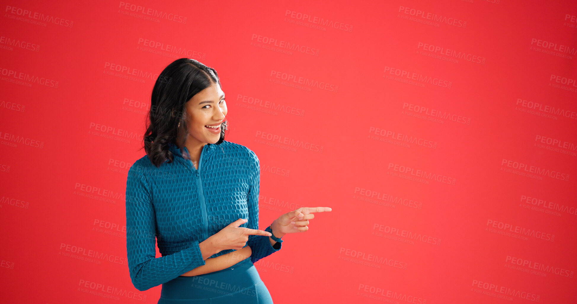 Buy stock photo Fitness, pointing and woman with portrait in studio, sports club discount and sign up for training. Promotion, membership sale and coach with mockup space for announcement, smile or red background