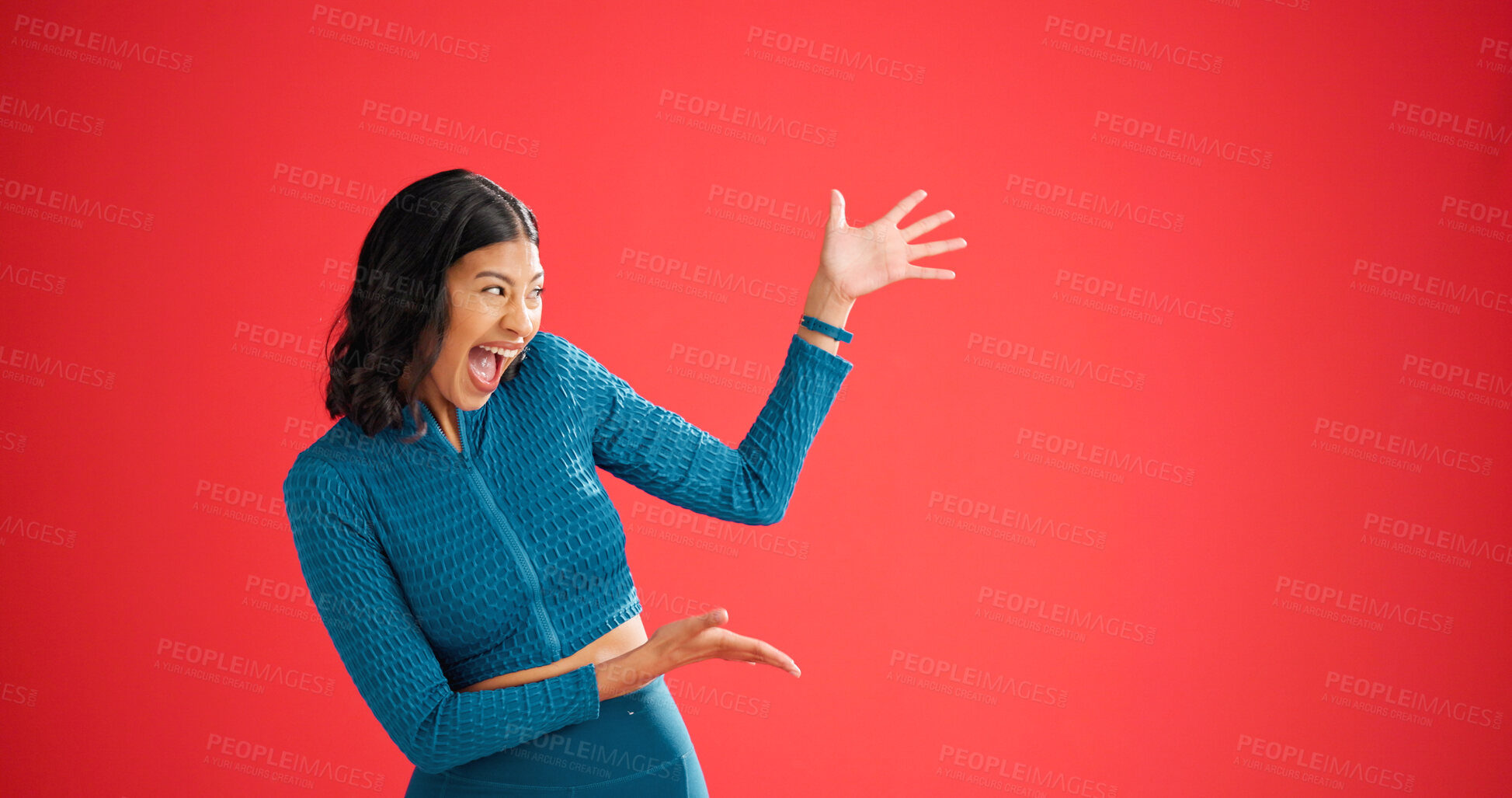 Buy stock photo Fitness, excited and woman with pointing in studio, sports club discount and sign up for training. Promotion, membership sale and coach with mockup space for announcement, smile and red background