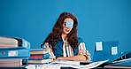 Burnout, tired and woman with sticky note in office, overworked and frustrated for mental exhaustion. Workload pressure, fatigue and person with do not disturb sign, overwhelmed and creative studio