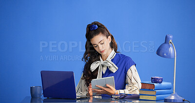 Buy stock photo Editing, laptop or woman in office with tablet, draft review or source feedback for article. Space, digital or journalist in creative studio with tech, fact check or industry research for publication