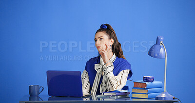 Buy stock photo Studio, think and business woman with laptop, story inspiration or retro on blue background. Serious, author and person with computer for idea, vintage and creative reflection for novel with space