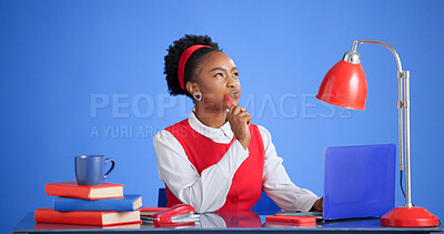Buy stock photo Studio, think and black woman with laptop for business, story inspiration or idea on blue background. Decision, author and person with computer for vision, planning or creative reflection for novel