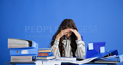 Buy stock photo Studio, headache and business woman with stress for financial crisis, overwork and audit data. Migraine, accountant and person with tax mistake, deadline pressure and chart on blue background