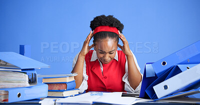 Buy stock photo Studio, headache or black woman with stress for business, overwork or audit with financial crisis. Migraine, accountant or person with tax mistake, deadline pressure or overwhelmed on blue background