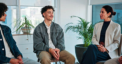 Buy stock photo Psychology, man and happy discussion in group therapy for healing, addiction recovery and support. Rehabilitation, people or male member in circle for relapse prevention, share progress or counseling