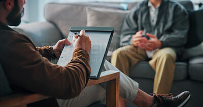 Buy stock photo Hands, clipboard and man on sofa by psychologist for support, help or advice on mental health. Nervous, notes and male person with life coach for therapy, wellness or counseling session at clinic.