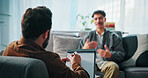 Talking, clipboard and man with psychologist in office for advice, help or life coaching session. Mental health, notes and therapist with male patient for emotional support, wellness or conversation.