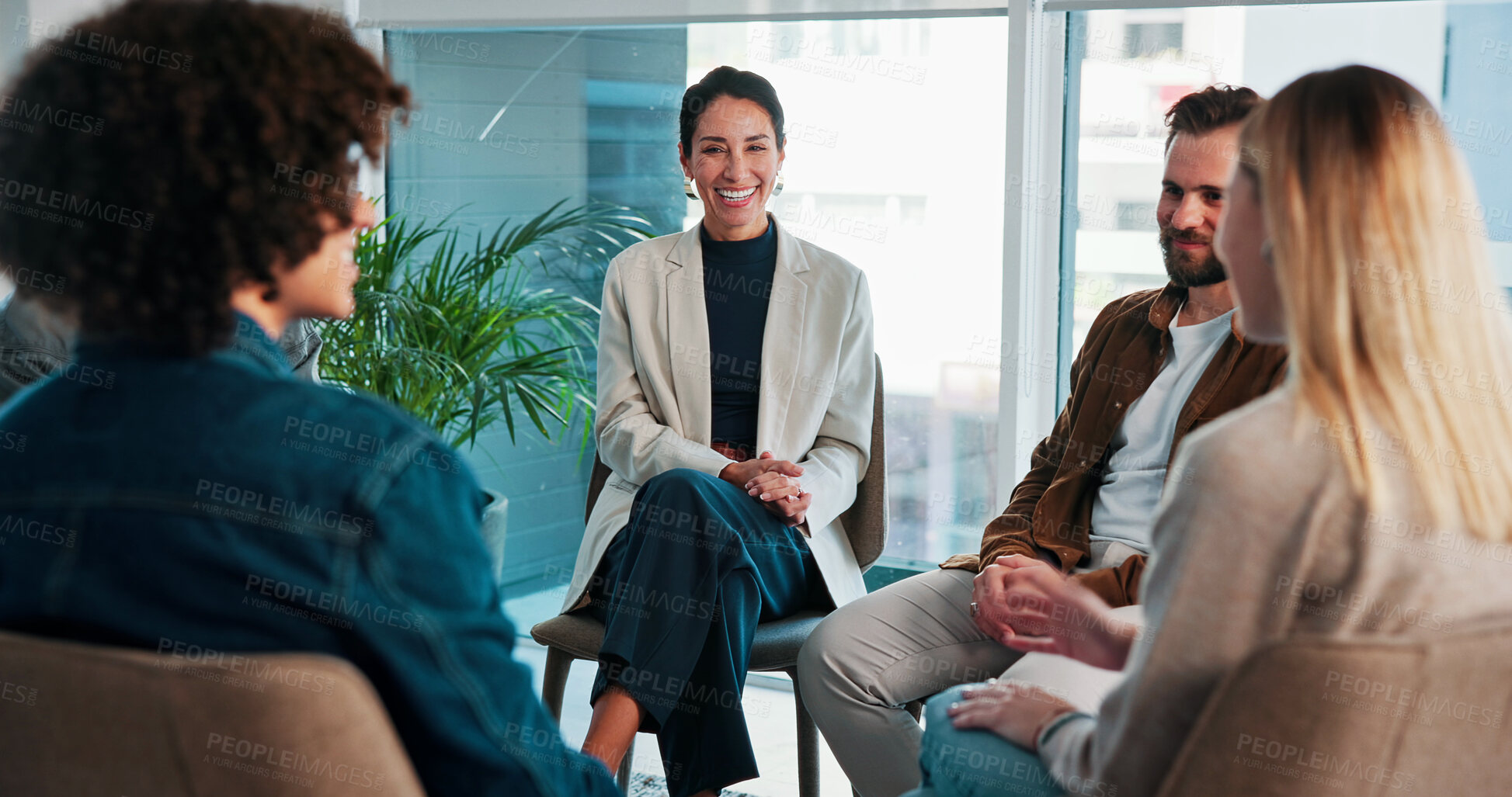 Buy stock photo Group, therapy and support for people talking about happy memory, mental health and healing. Men, woman and counselling with feedback, trust and community with progress, discussion and wellness