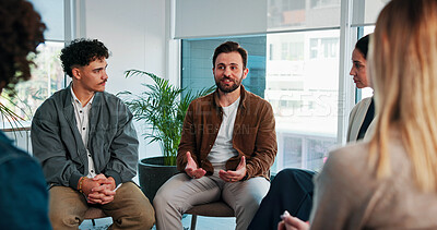 Buy stock photo Group, therapy and talking to people for support and experience, mental health or healing. Men, women and happy for counselling with feedback, trust and community with diversity, discussion or help