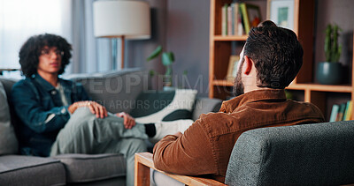 Buy stock photo Talking, sofa and therapist with patient in office for advice, help or life coaching session. Mental health, consulting and psychologist with man for emotional support, wellness or conversation.
