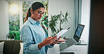 Woman, finance or reading documents with laptop in home for online investment, expenses or bills. Female person, freelancer or remote work with computer or paperwork for financial planning or budget