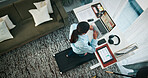 Woman, walking or treadmill with laptop on standing desk above for finance or research in home. Top view, female person or freelancer with computer, paperwork or tablet for remote work in house