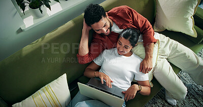 Buy stock photo Watching, movie and couple with laptop on couch, together or laughing with partner on break in house. Streaming, above and people with subscription for comedy channel, home and chill with funny film