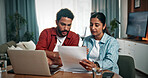 Couple, laptop and home with documents for finance, expenses or budget planning together. Man, woman or checking invoice with computer or paperwork for financial audit, bills or investment in house