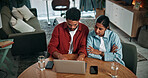 Laptop, discussion and couple in home with online banking for property investment, bills or mortgage. Technology, conversation and man with woman on computer for loan application together in house.