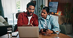 Laptop, phone and couple in conversation in home with online banking for property investment or bills. Technology, discussion and man with woman on computer for loan application together in house.