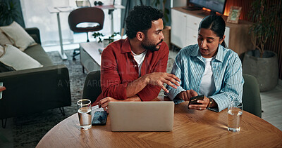 Buy stock photo Laptop, cellphone and couple in home with online banking for property investment, bills or mortgage. Technology, discussion and man with woman on computer for loan application together in house.