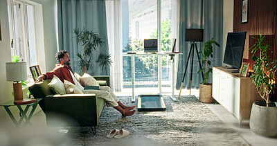Buy stock photo Relax, happy and man on sofa for watching tv, streaming series and movie subscription. Space, home and person on couch for rest, break and chill with entertainment, channel and media on weekend