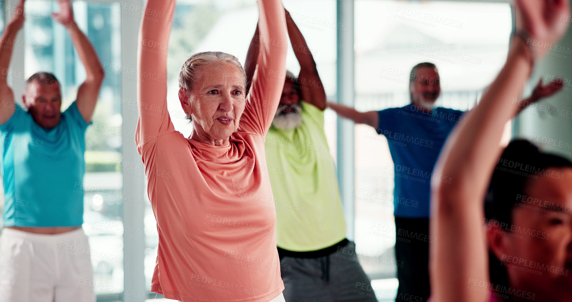 Buy stock photo Old woman, stretching and instructor in yoga class for fitness, exercise and holistic balance. Group, elderly people and warm up with upward salute for yogi, spiritual healing and retirement hobby