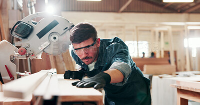 Buy stock photo Man, carpenter and miter saw for wood at workshop with manufacturing process at industrial plant. Person, power tools and technician with equipment for cutting, material and safety goggles at factory