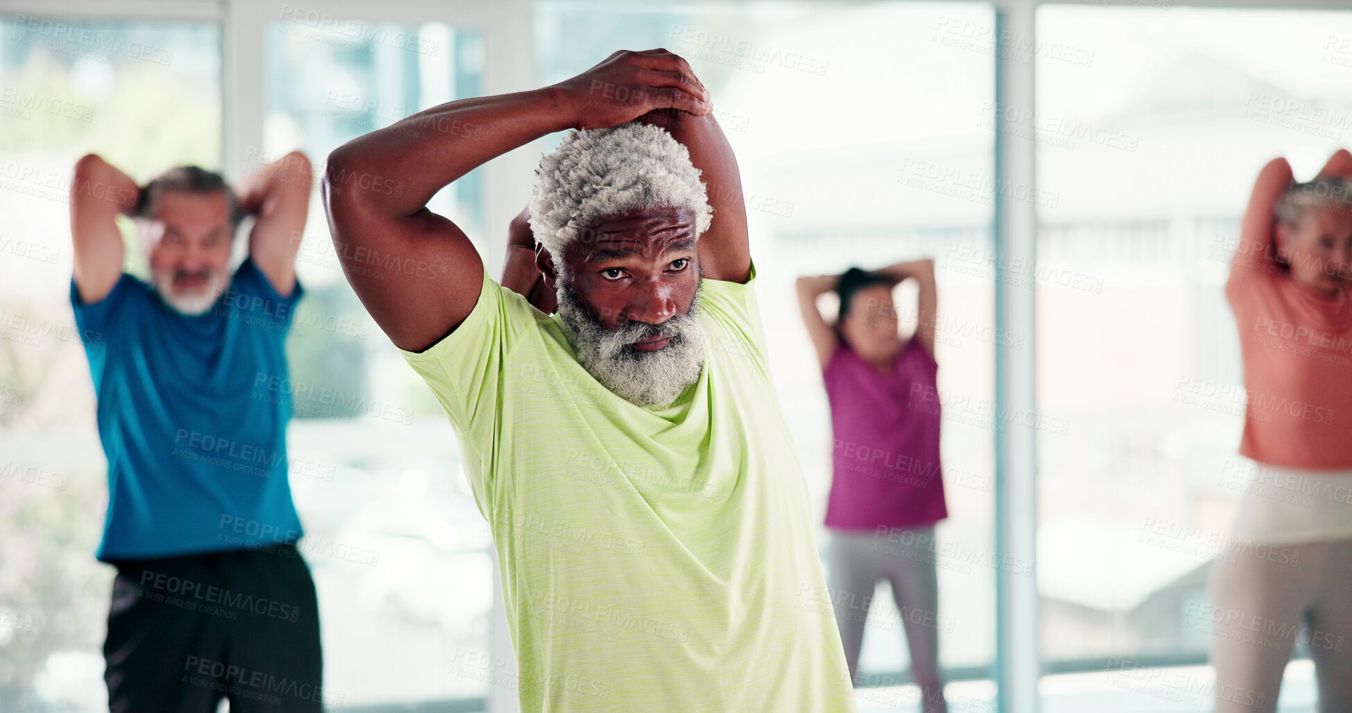 Buy stock photo Old man, stretching and instructor in yoga class for fitness, exercise lesson and holistic balance. Group, elderly people and warm up muscle for training session, morning routine and retirement hobby
