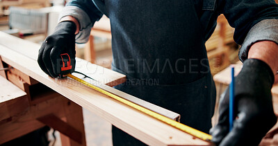 Buy stock photo Measuring tape, woodworker and man in workshop for project, planning and manufacture furniture. Industry, craft and male carpenter with equipment on timber material for small business in factory.