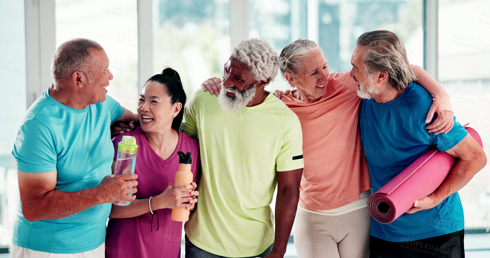 Buy stock photo Senior, people and laugh in yoga class in studio for fitness community, club membership and health. Funny group, elderly yogi friends and happy hug for exercise joke, retirement wellness and support