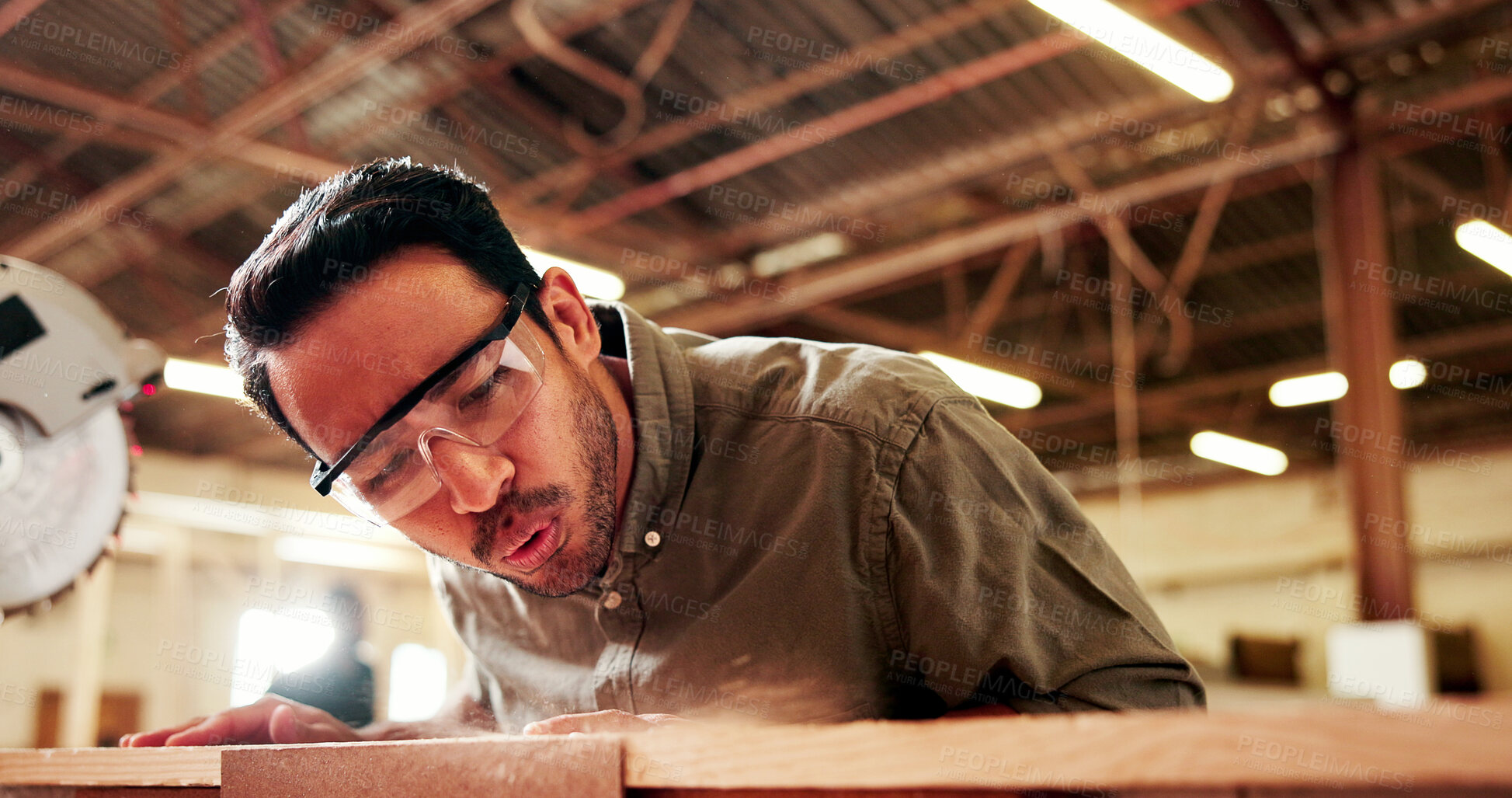 Buy stock photo Blow, woodworking and sawdust with man in warehouse for manufacturing or production process. Cleaning, ppe and safety with person in carpentry factory for construction of industrial furniture