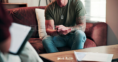 Buy stock photo Hands, anxiety and man on sofa with psychologist for help, advice or feedback on mental health. Assessment, psychiatry and male person with depression in therapy session for wellness at clinic.