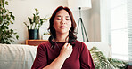 Breathe, holistic therapy and woman on sofa for calm, mindfulness and healing for counseling. Psychology, somatic therapist and person with breathwork for awareness, emotions regulation and energy