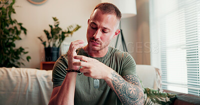 Buy stock photo Serious, man and healing with eft tapping, therapy appointment and process military trauma on couch. Calm, soldier and person on sofa for mental health wellness, session and psychological acupressure