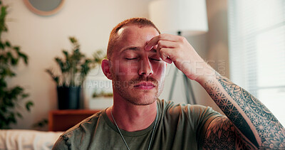 Buy stock photo Relax, eft and balance with man on sofa in home for ptsd treatment, mental health and chakra. Pressure point, trauma release and zen with person tapping in living room of house for holistic treatment