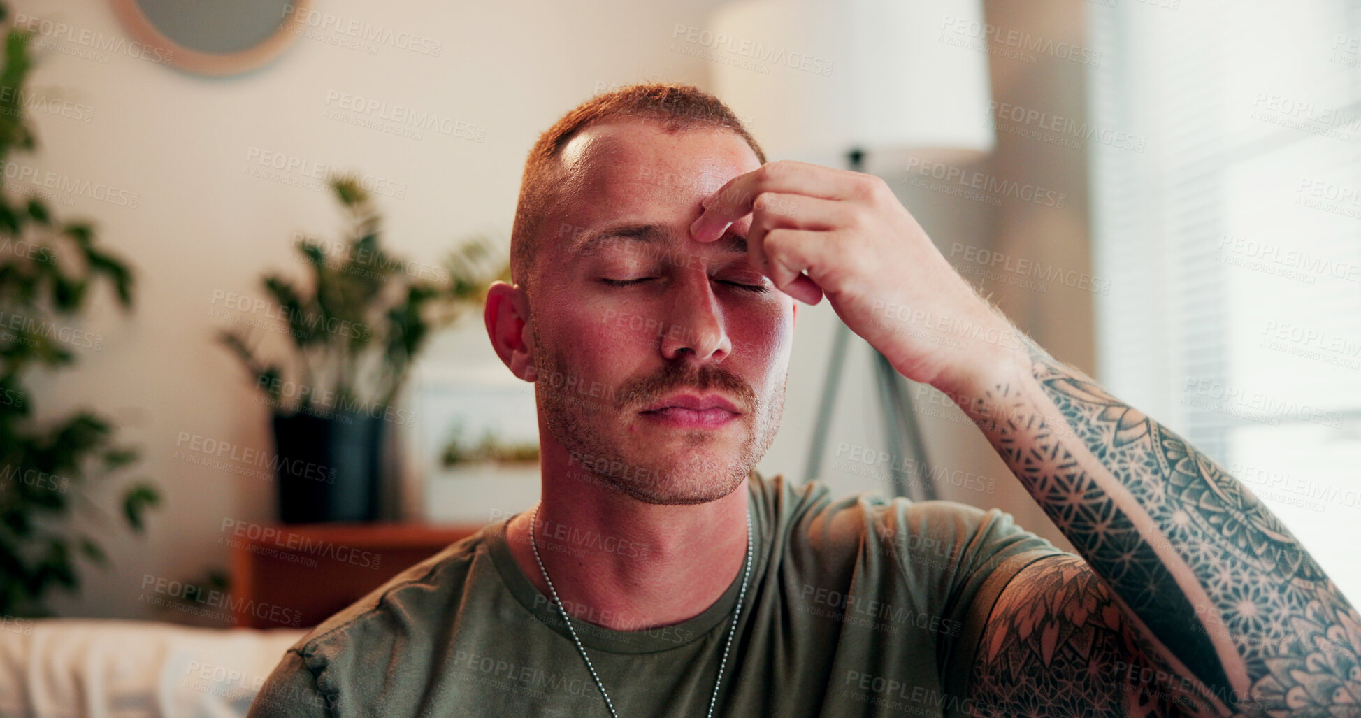 Buy stock photo Relax, eft and balance with man on sofa in home for ptsd treatment, mental health and chakra. Pressure point, trauma release and zen with person tapping in living room of house for holistic treatment