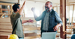 Men, high five and excited with carpenter at factory for thanks, success and promotion at plant. People, team and celebration with smile, motivation and achievement with manufacturing at warehouse