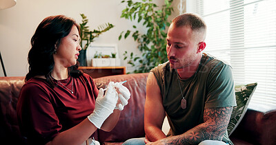 Buy stock photo Needle, consultation and nurse with man on sofa in home for medical checkup with immunization. Professional, injection and healthcare worker with male patient for wellness shot in living room. 