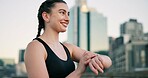 Fitness, smile and watch with woman in city for progress, training or workout tracking as athlete. Buildings, exercise and time with happy runner outdoor in urban town for health or wellness activity